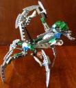 green-mask-nidhiki-body-down-claws-up-side-view-2.jpg