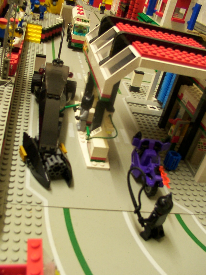 sometimes_even_batman_needs_gas.02.jpg
