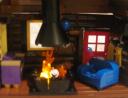 winter_cabin_lighted_fireplace.jpg