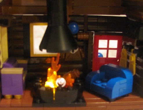 winter_cabin_lighted_fireplace.jpg