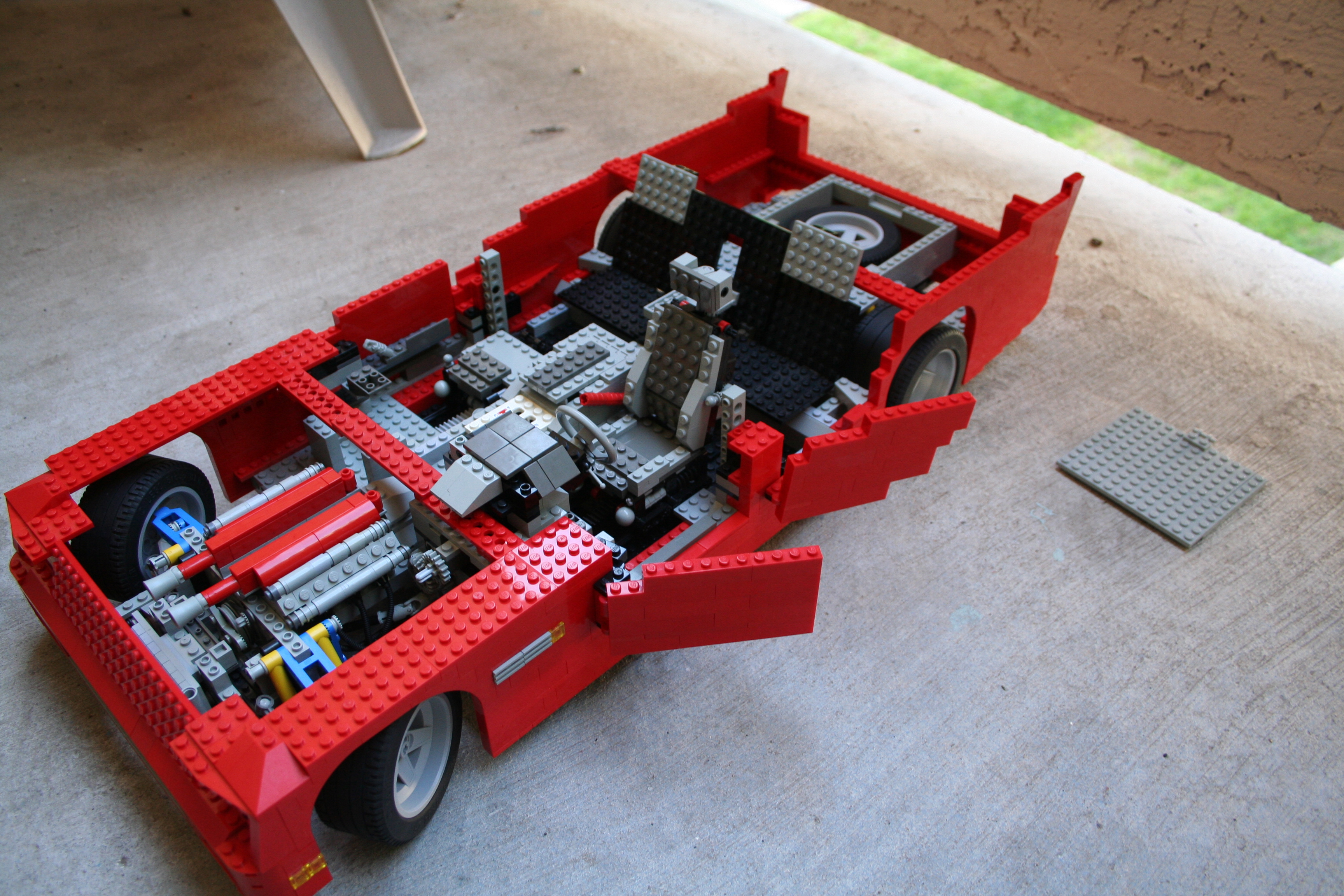 red_sedan_front_doors_uncomp.jpg