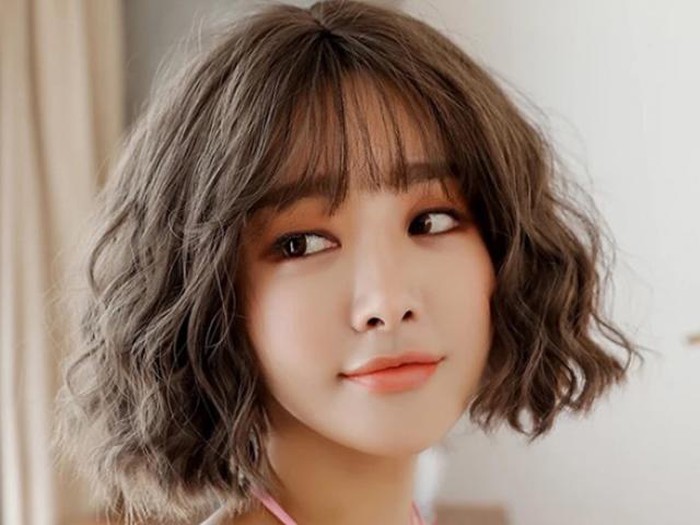 Tóc ngắn xoăn sóng nước - Kiểu tóc thời thượng và quyến rũ Gallery 1