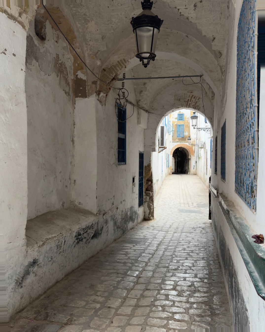 Tunisia Cruise Port - Whitewashed Stone Archway Cobblestone Passage - 05-16-2025 - Vertical 12.jpg