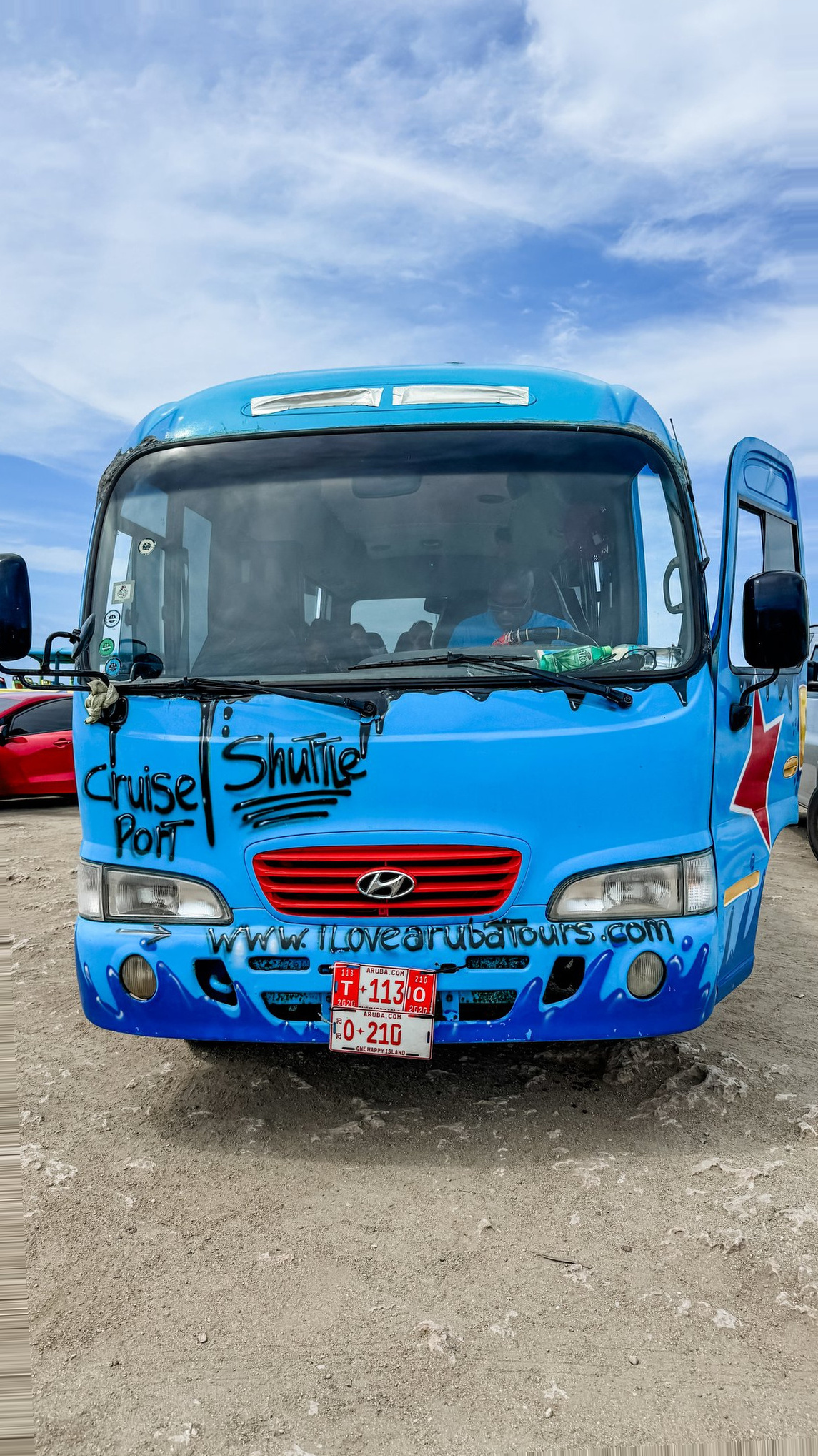 Aruba Cruise Port - Branded Shuttle Vehicle Vibrant Blue Exterior - 03-18-2025 - Vertical.jpg