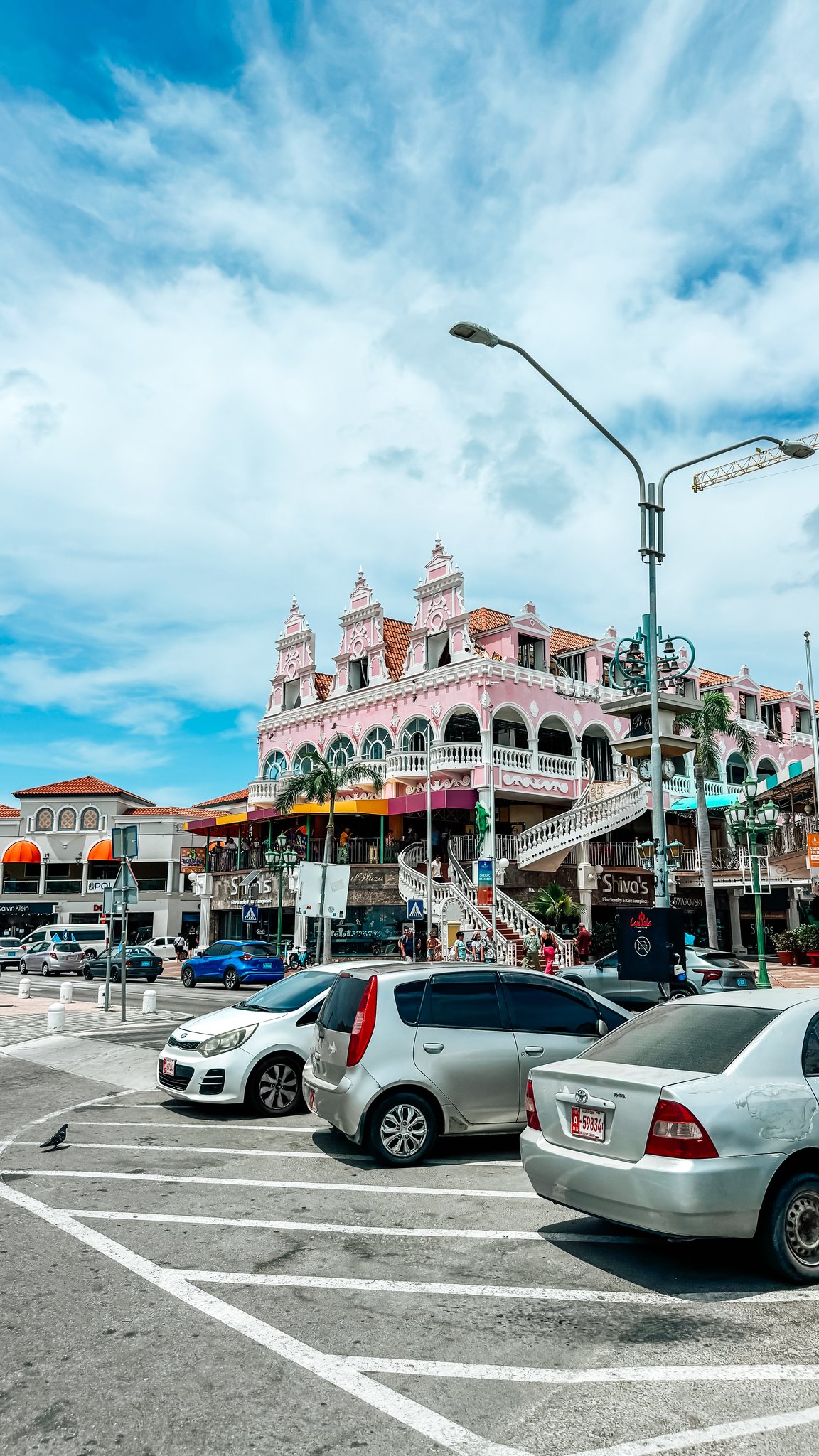 Aruba Cruise Port - Colorful Architectural Facade Ornate Balconies Streetside - 03-18-2025 - Vertical.jpg