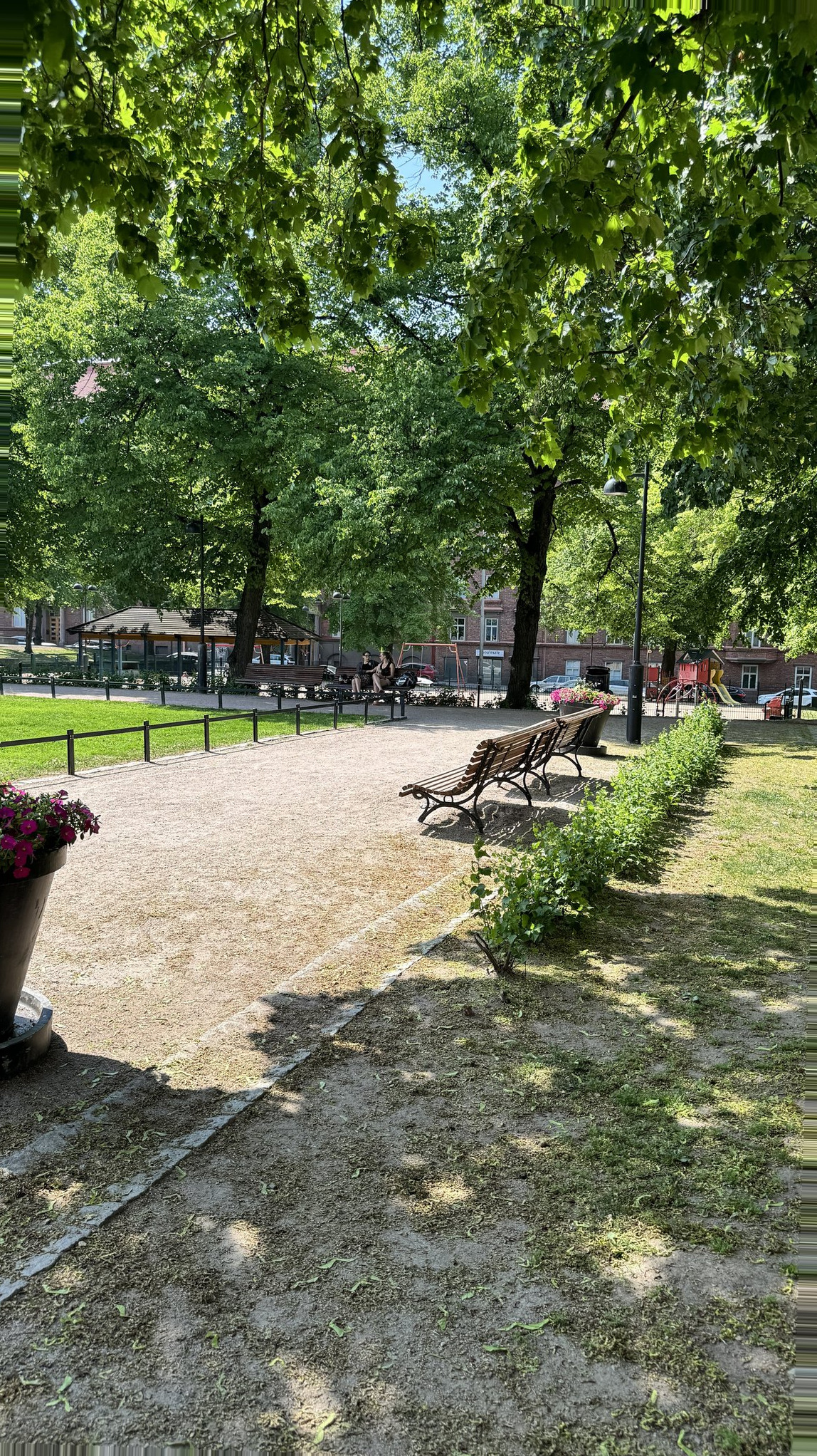 Helsinki Finland Cruise Port - Lush Green Foliage Wooden Benches Floral - 06-01-2024 - Vertical.jpg