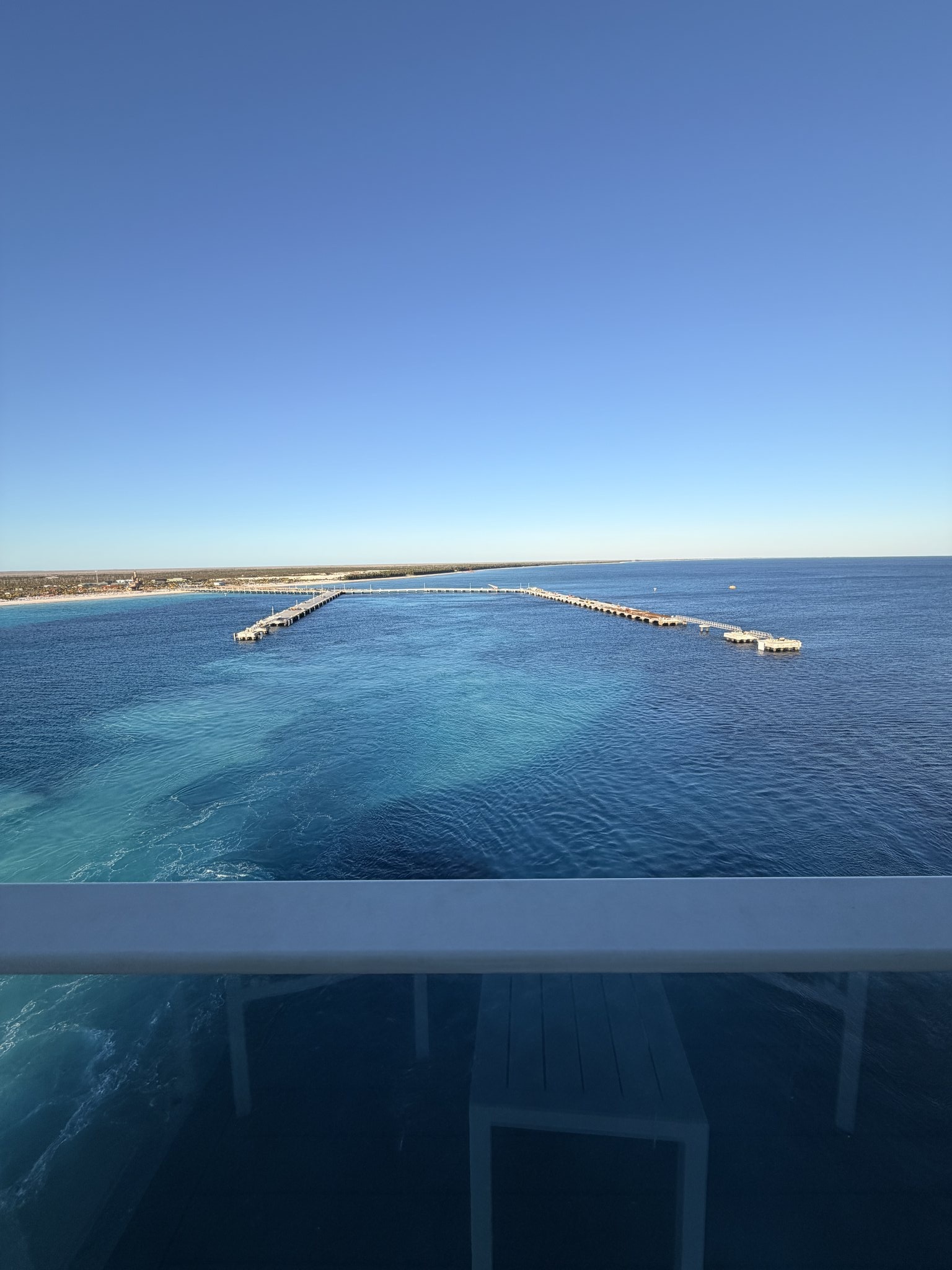 Celebration Key Cruise Port - City Of Freeport Bahamas Vast Blue Water Horizon - 02-06-2026 - Vertical.jpg