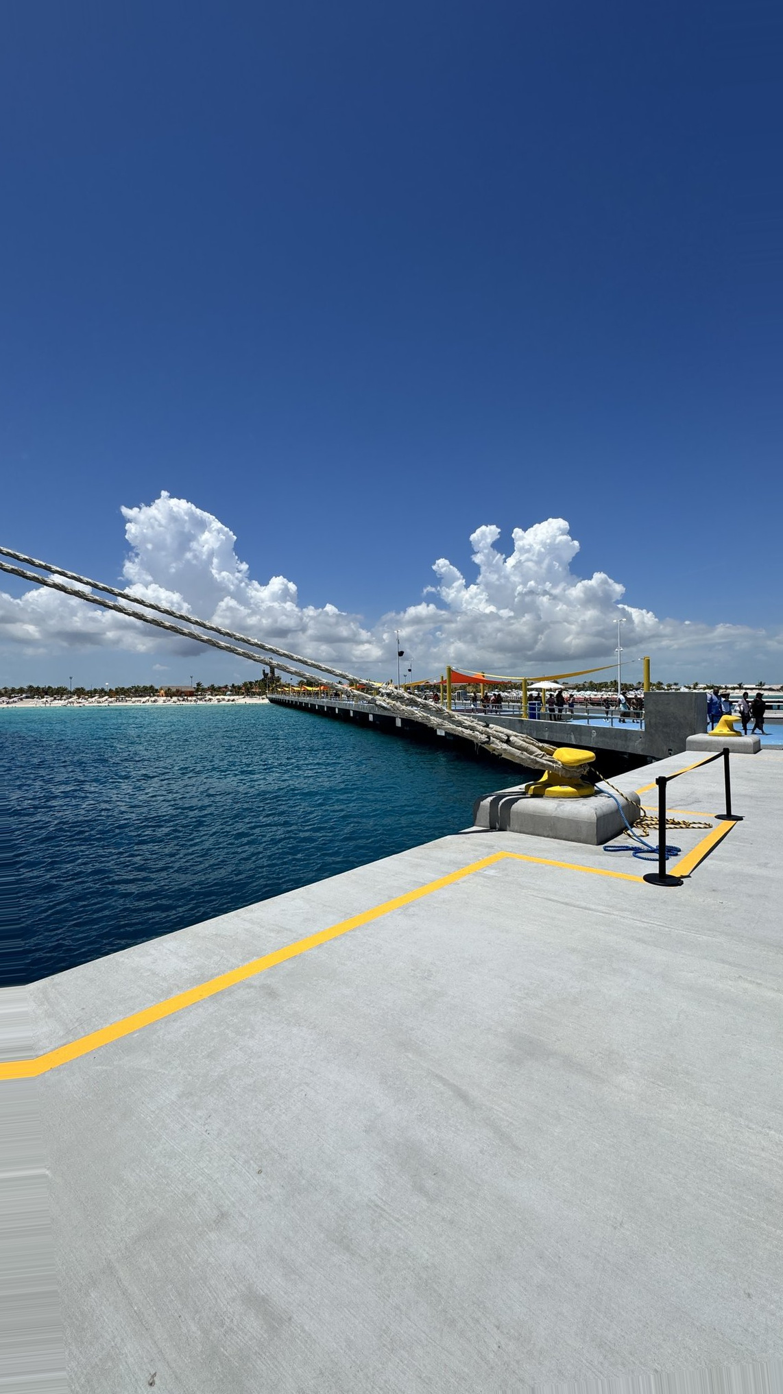 Freeport Cruise Port - Bahamas Concrete Pier Vibrant Blue Sky Puffy - 08-01-2025 - Vertical.jpg