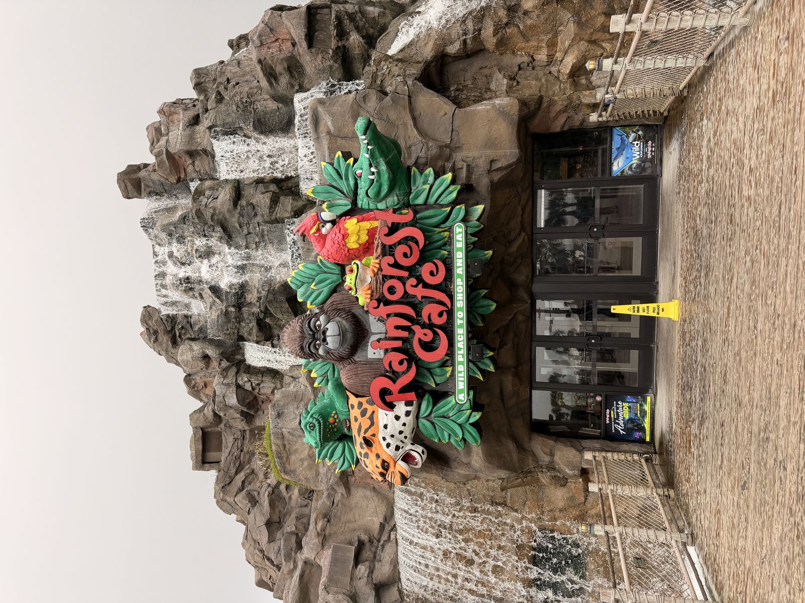 Galveston Cruise Port Rainforest Cafe USA MSC Seascape - colorful Mayan art sign with jaguar and tropical flowers at Galveston - 2026-04-03 - Landscape.jpg