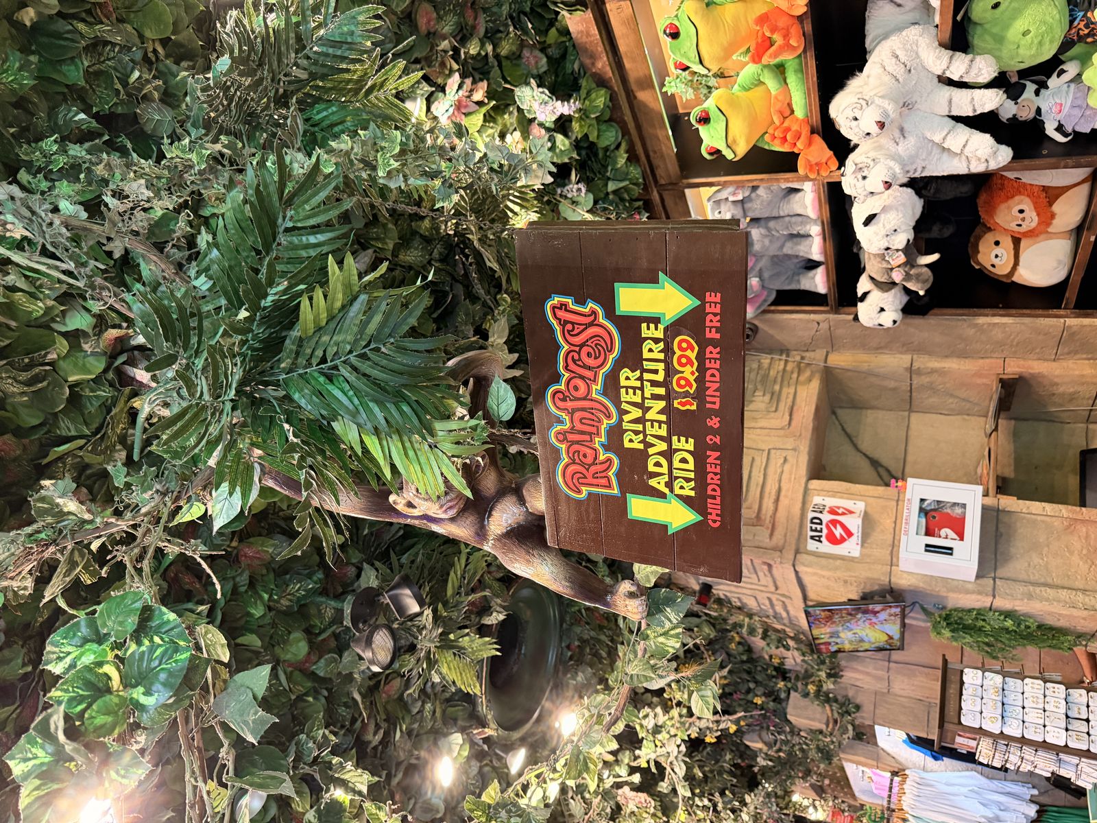 Galveston Cruise Port Rainforest Cafe USA MSC Seascape - rainforest adventure with rope swing sign, tropical foliage, souvenir shop displ - 2026-04-03 - Landscape.jpg