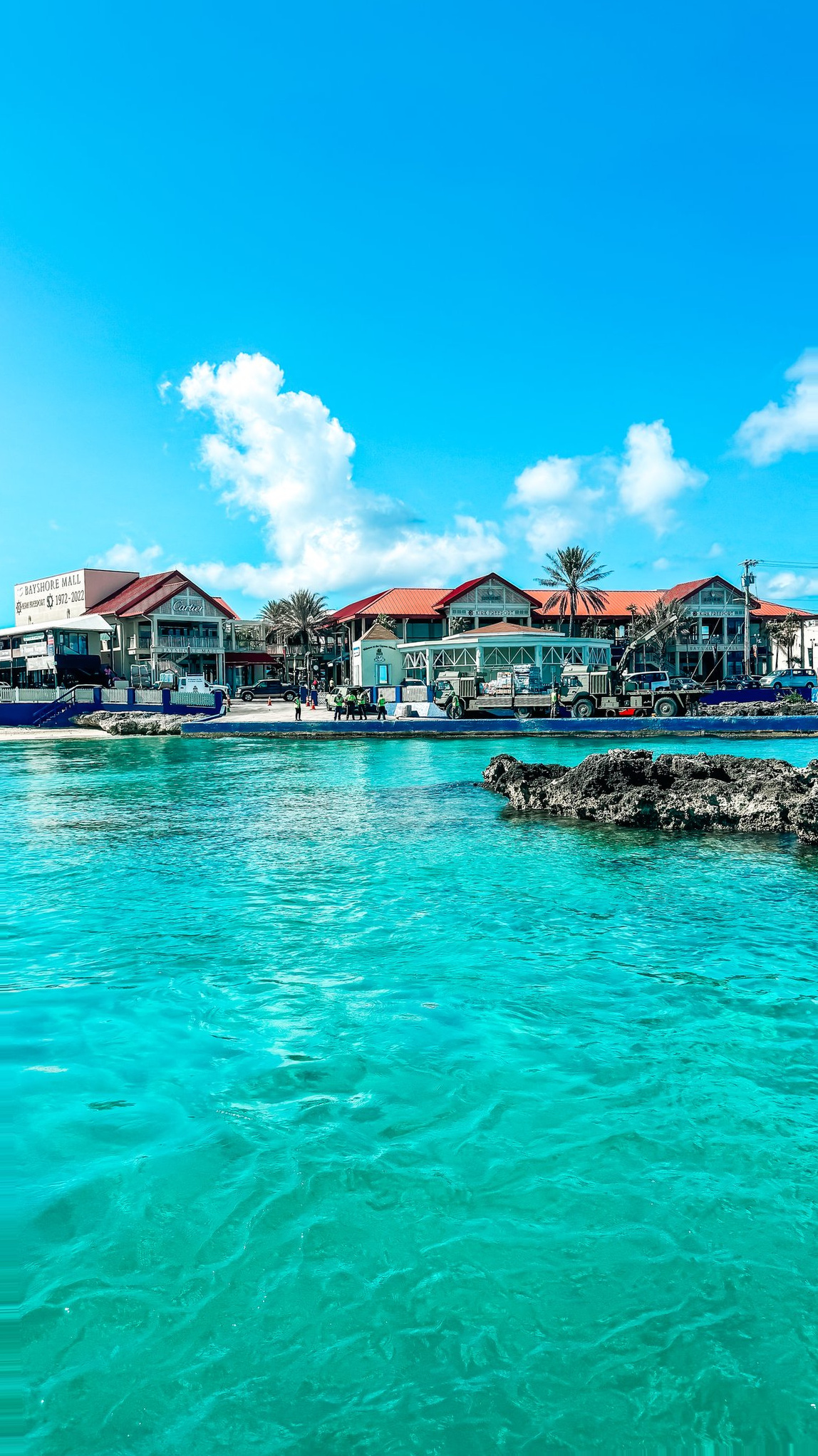 Grand Cayman Cruise Port - Cayman Georgetown Vibrant Tropical Buildings Turquoise Waterfront Landscape - 05-01-2024 - Vertical.jpg