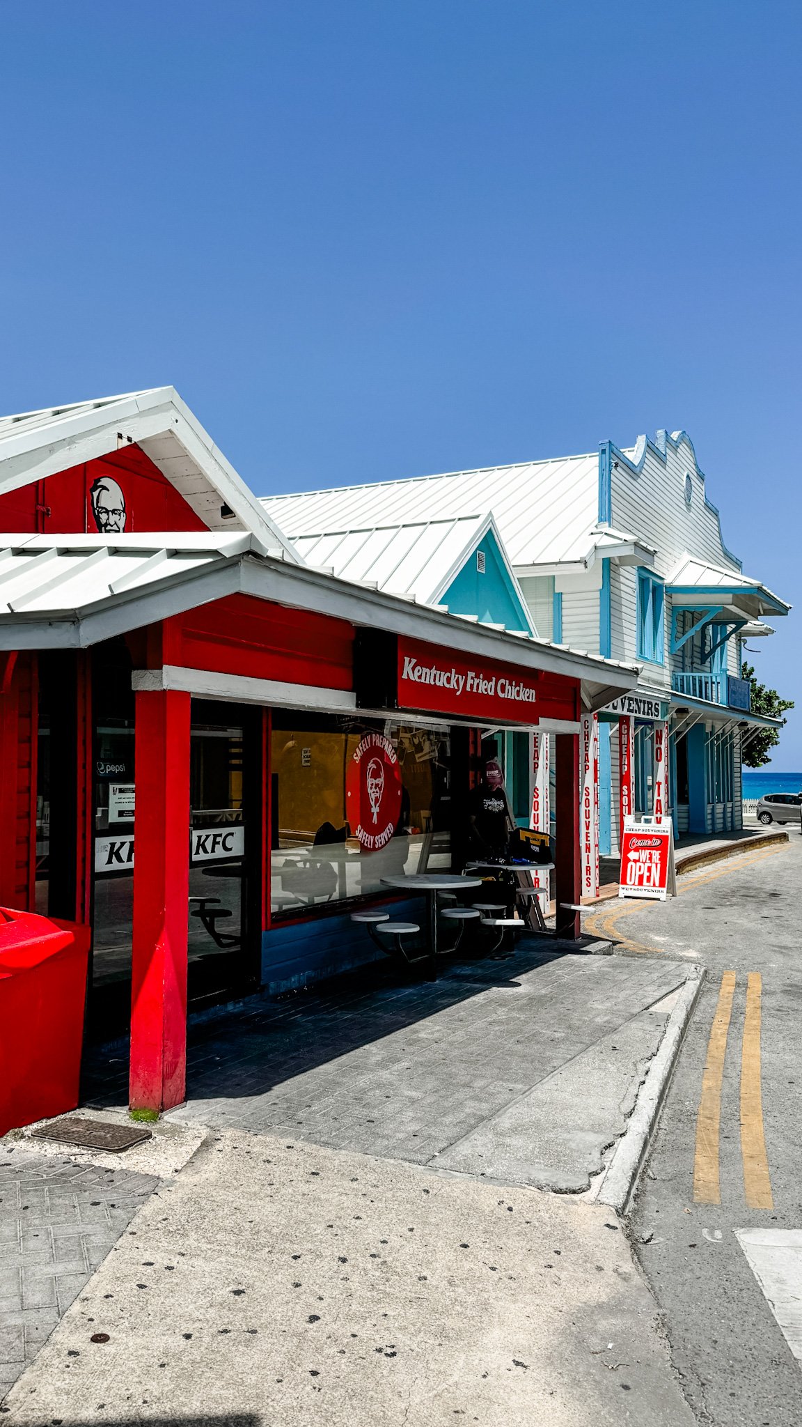 Grand Cayman Cruise Port - Cayman Grand Kentucky Fried Chicken Branded Building Red - 07-02-2024 - Vertical.jpg