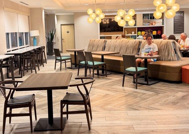 Complimentary breakfast dining area at the Hampton Inn and Home2 Suites Cape Canaveral