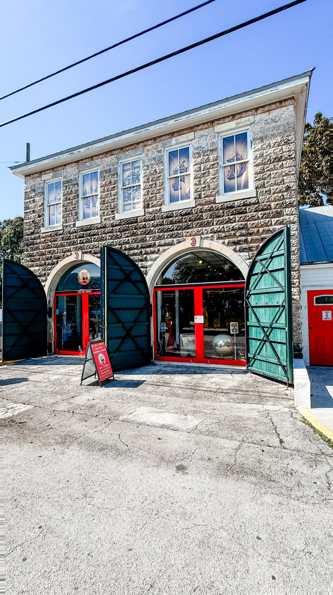 Key West Cruise Port - Stone Building Arched Entrances Red Accents - 03-01-2025 - Vertical.jpg