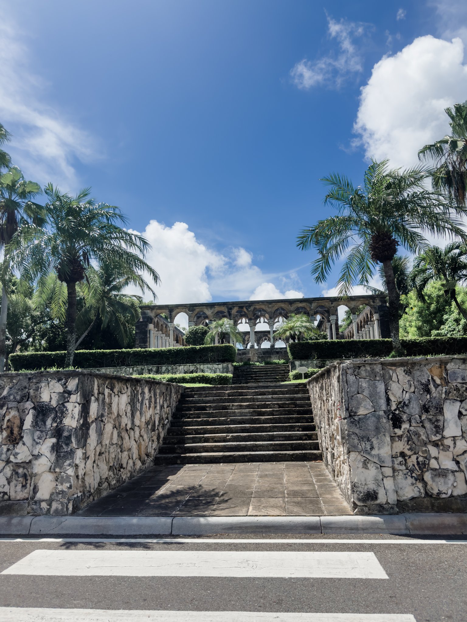 Nassau Cruise Port - A grand, stately building surrounded by lush palm - 09-06-2024 - Vertical.jpg