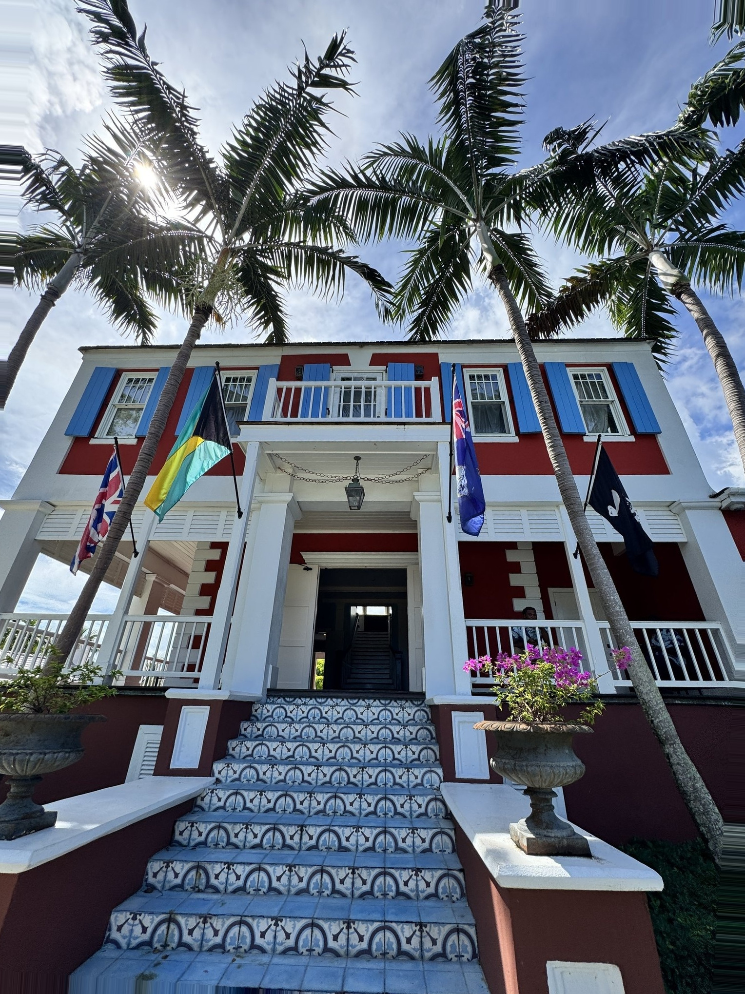 Nassau Cruise Port - Colorful Bahamian Building with Palm Trees - 09-20-2025 - Vertical.jpg