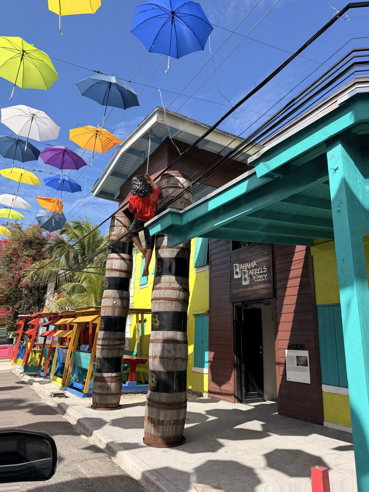 Nassau Cruise Port - Colorful Umbrella-Lined Promenade in Bahamas - 11-06-2025 - Vertical.jpg