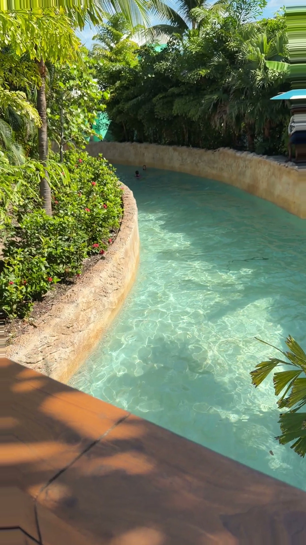 Nassau Cruise Port - Lush Tropical Pool Surrounded by Greenery - 11-06-2025 - Vertical.jpg