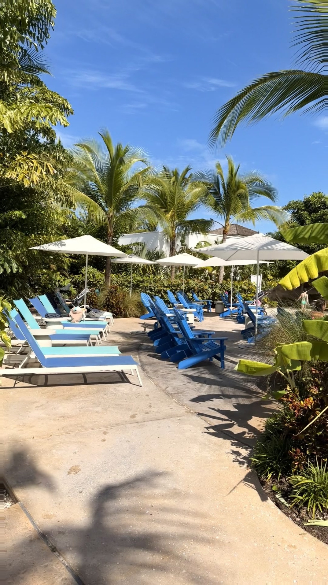 Nassau Cruise Port - Tropical Poolside Lounge Chairs and Umbrellas - 11-06-2025 - Vertical.jpg