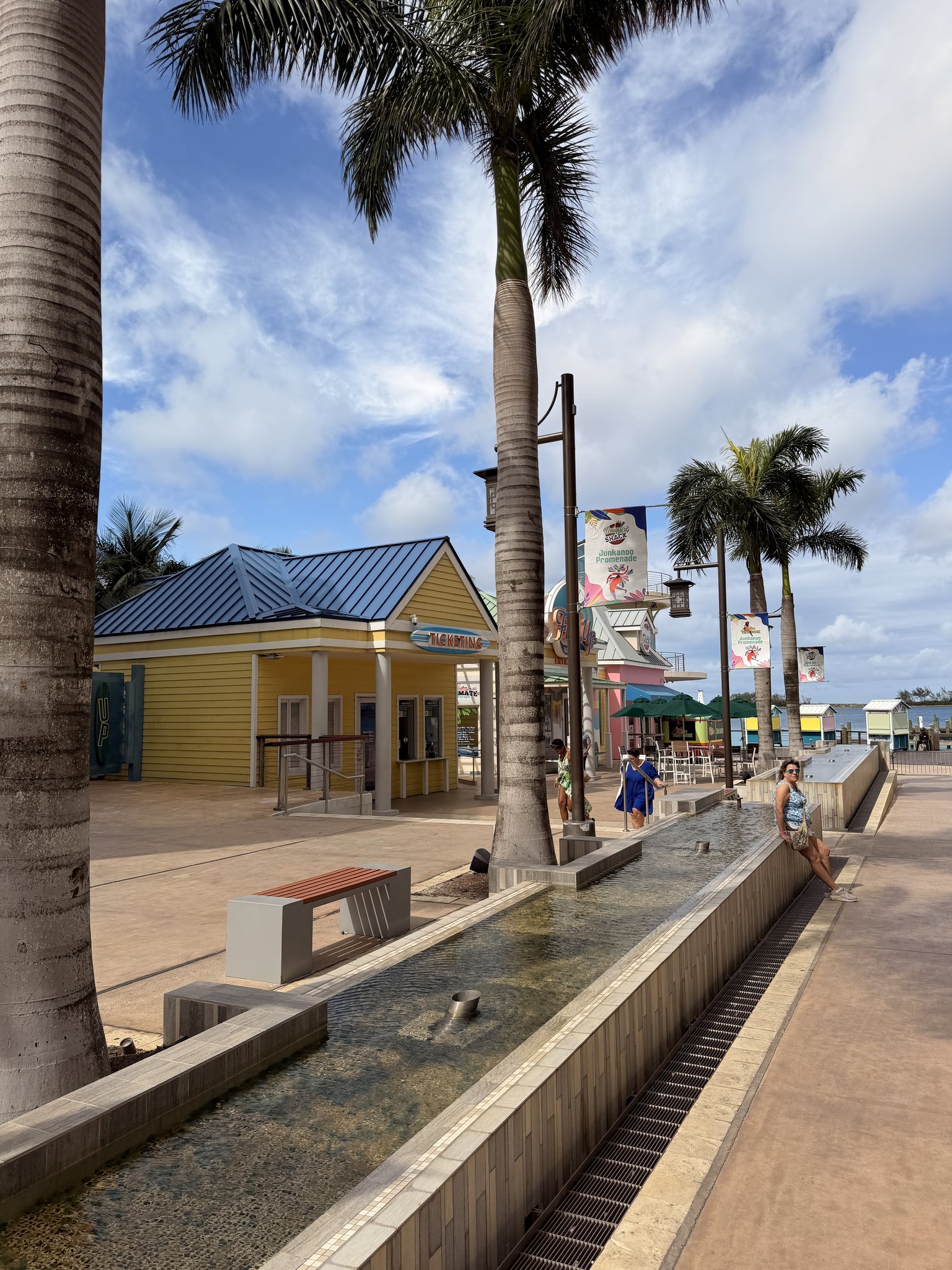 Nassau Cruise Port - Tropical Waterfront Walkway Palm Trees Colorful Buildings - 02-05-2026 - Vertical.jpg