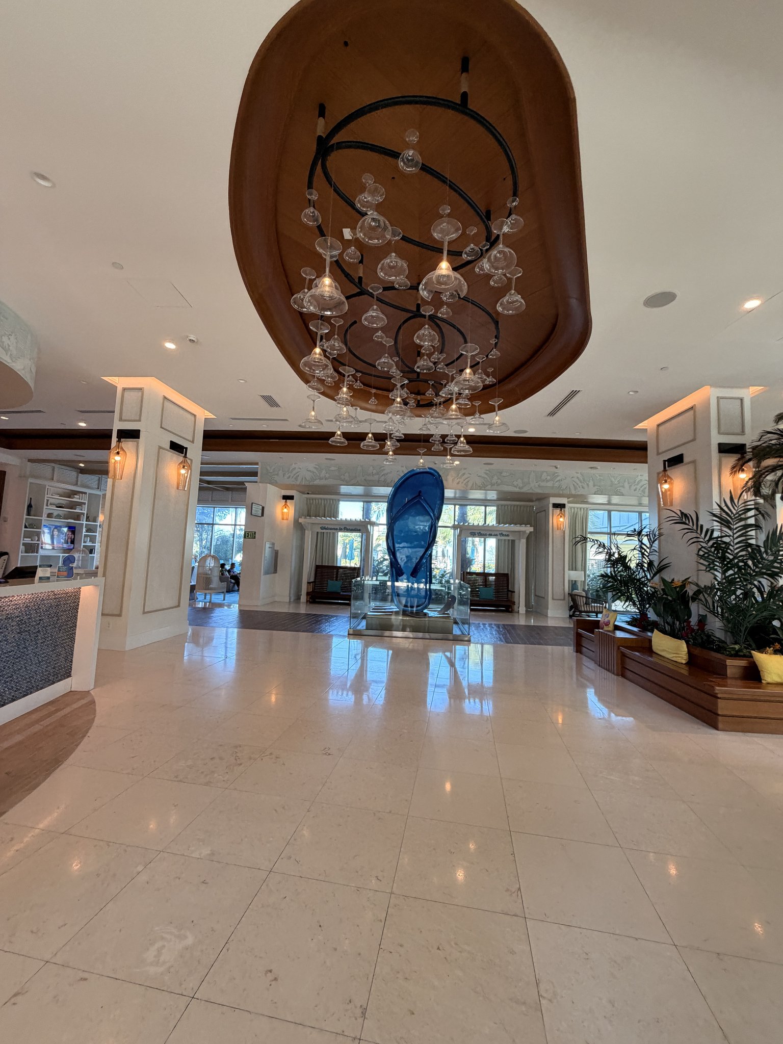 Nassau Cruise Port - Wooden Glass Crystal Display Elegant Chandelier Marble Lobby - 02-05-2026 - Vertical.jpg