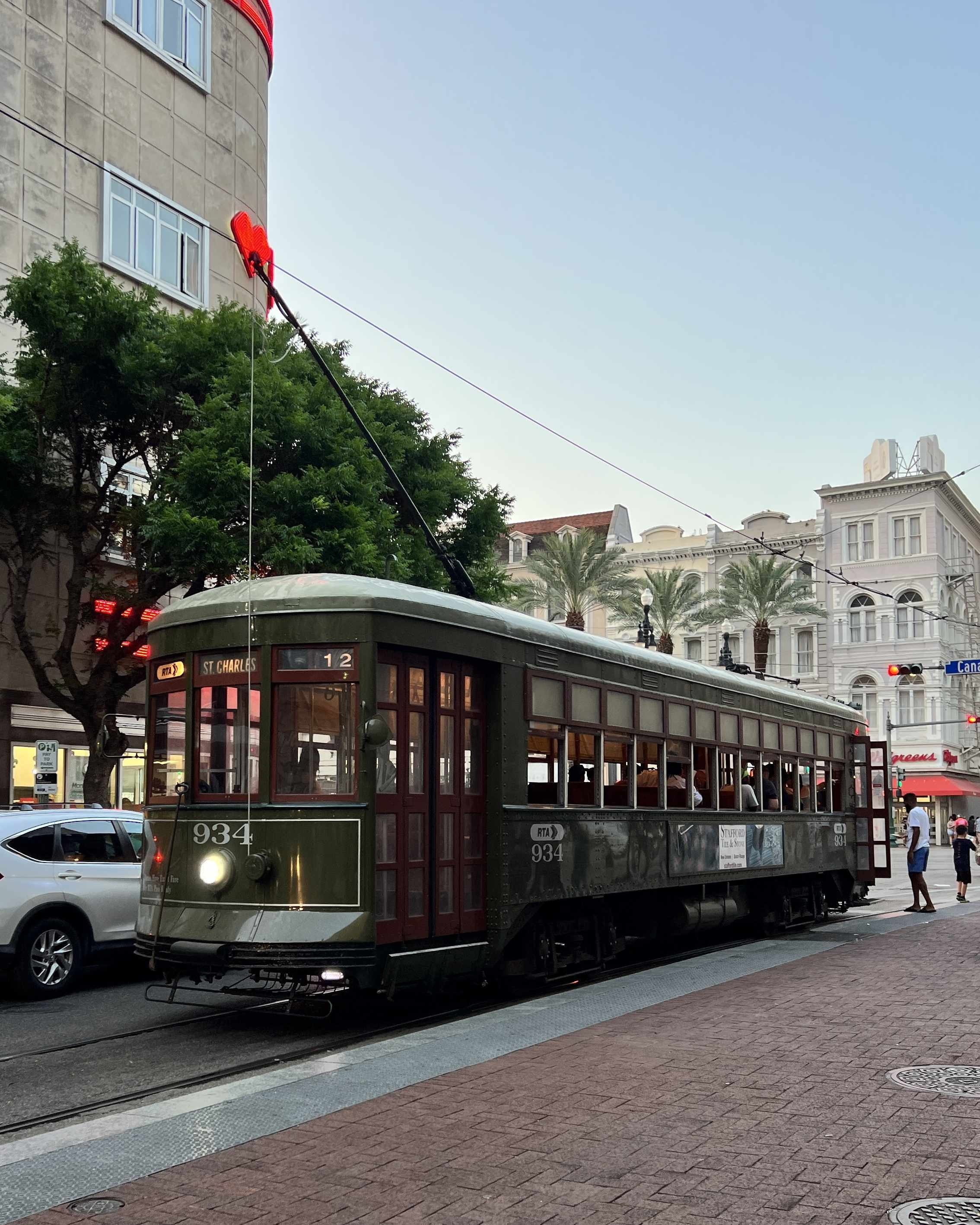 New Orleans Cruise Port - A Street Scene with a Trolley Car on the Side of the Road - Vertical.jpg