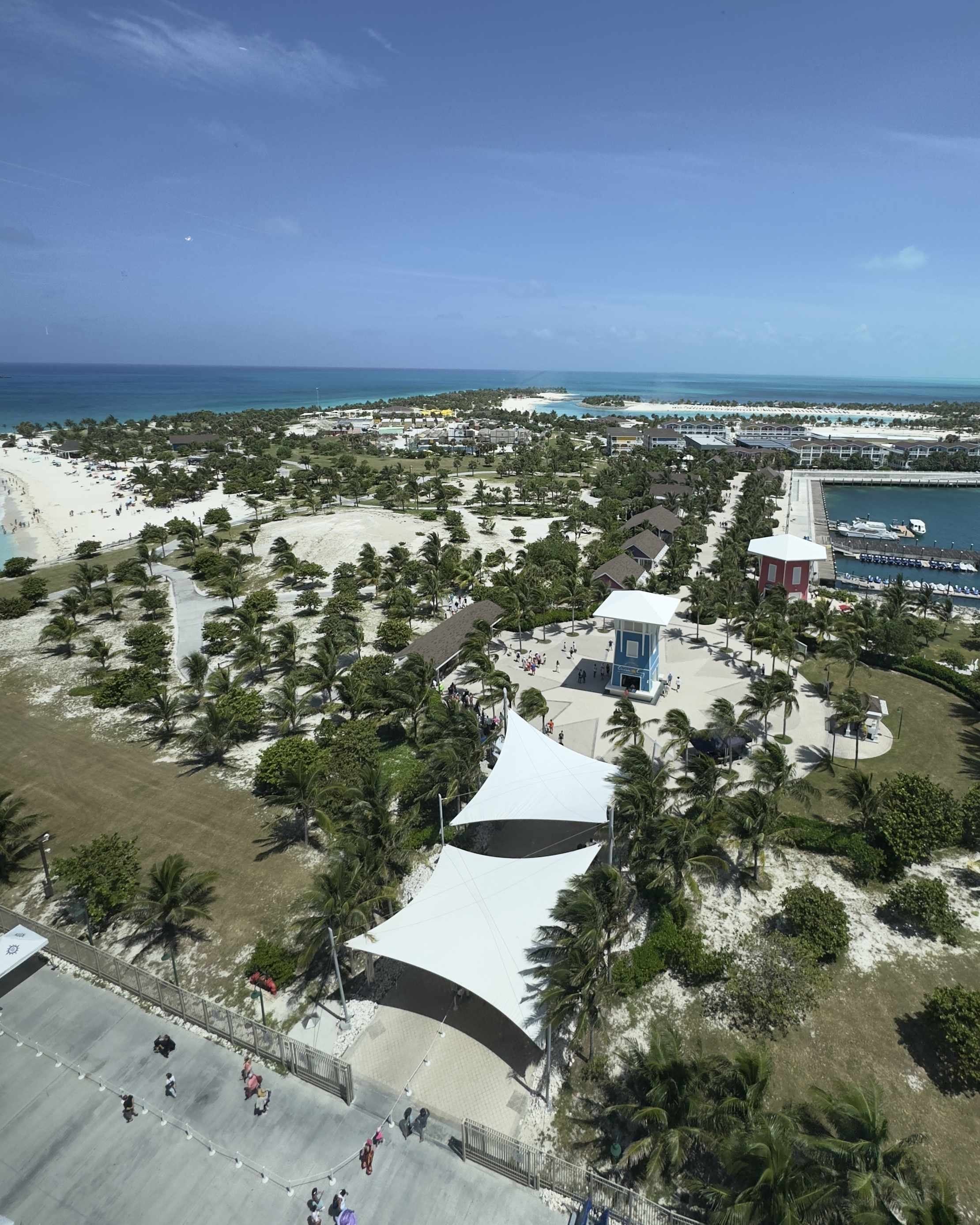 Ocean Cay Cruise Port - An Aerial View of a Beach with a Pier in the Background - Vertical.jpg