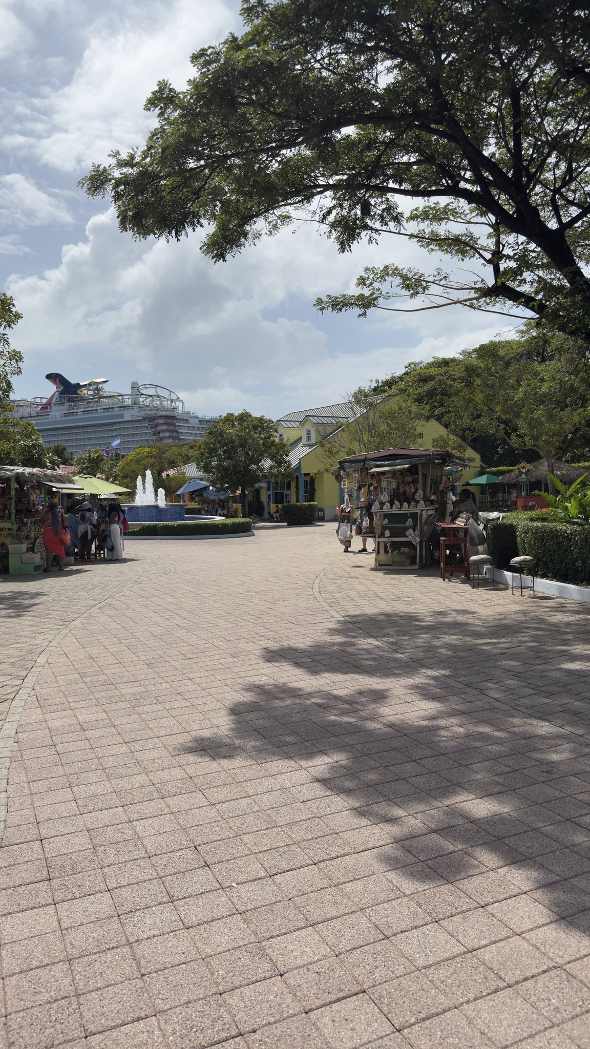 Roatan Cruise Port - Honduras Honduras Tropical Foliage Charming Marketplace Outdoor Fountain - 02-05-2025 - Vertical.jpg