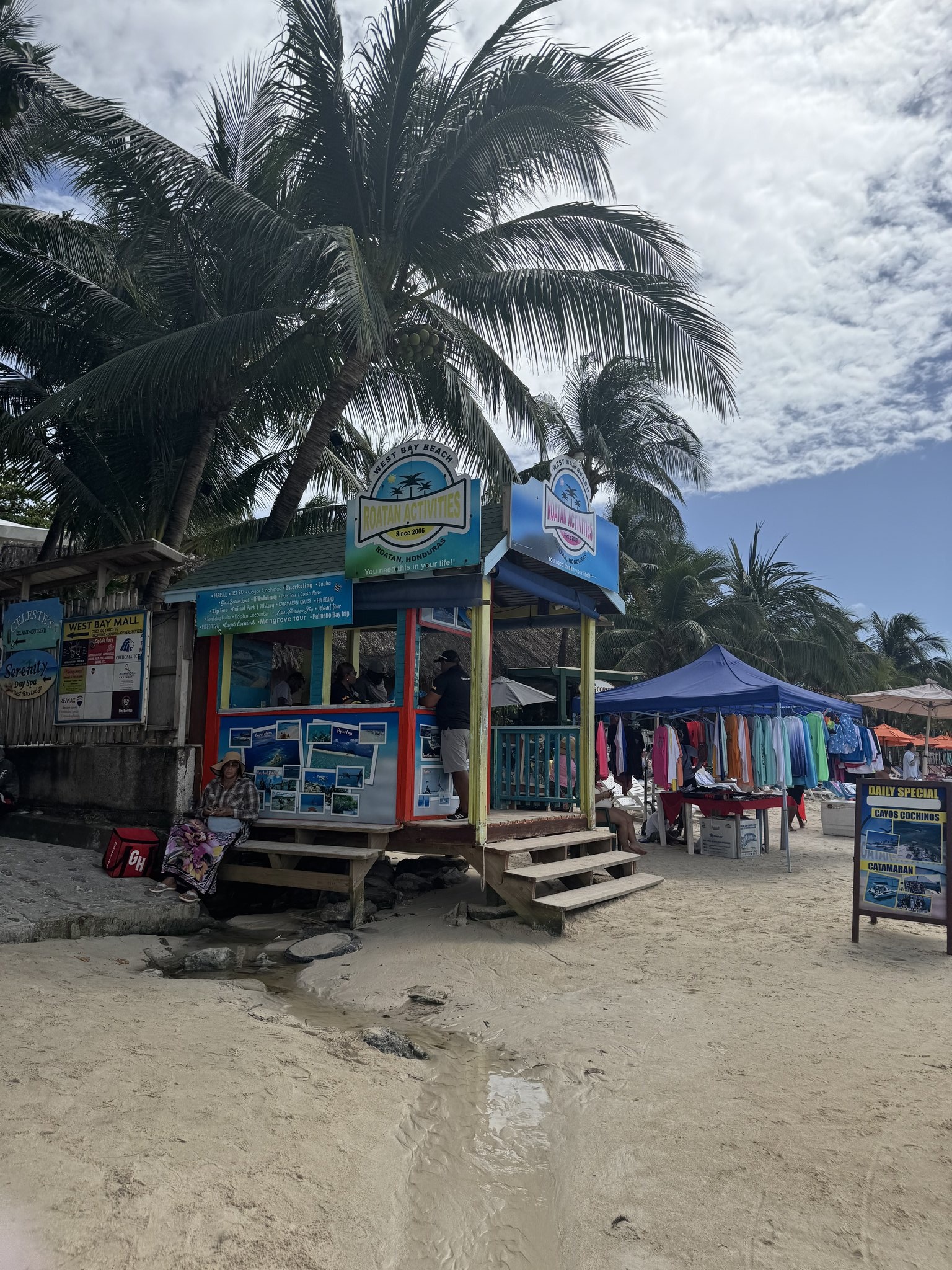 Roatan Cruise Port - Honduras Photos Honduras Vibrant Beach Souvenir Storefronts Lush - 02-05-2025 - Vertical.jpg