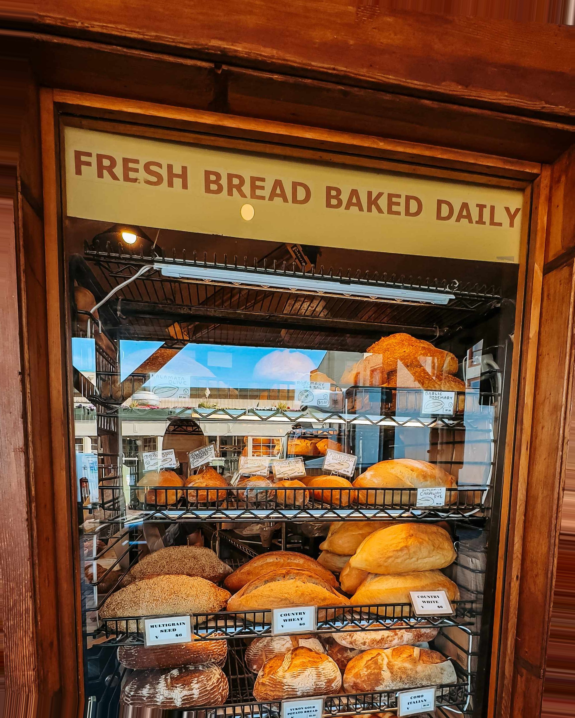 Seattle Cruise Port - A Display of Breads in a Bakery Window - Vertical.jpg