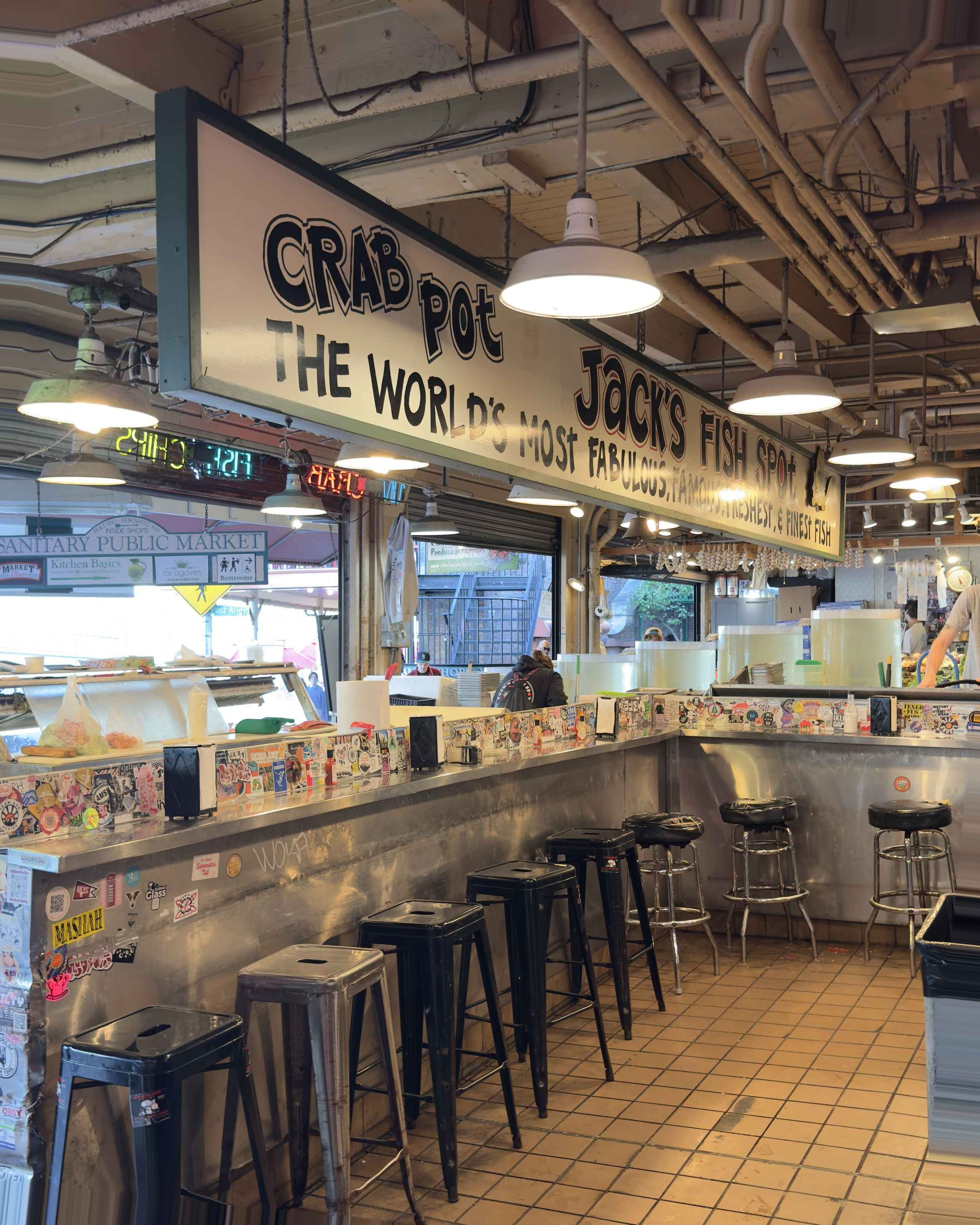 Seattle Cruise Port - A Restaurant with a Lot of Tables and Chairs - Vertical.jpg