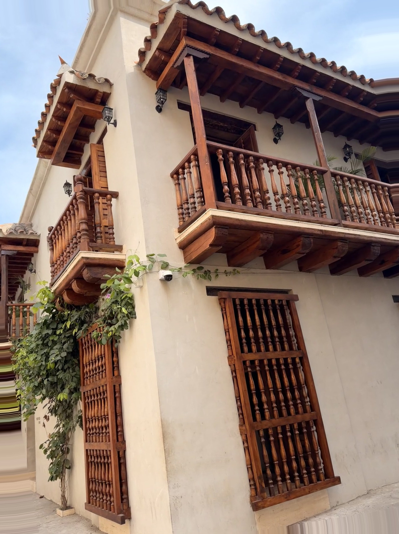 Cartagena Colombia Cruise Port - Ornate Wooden Balcony and Arched Facade - 01-03-2026 - Vertical.jpg