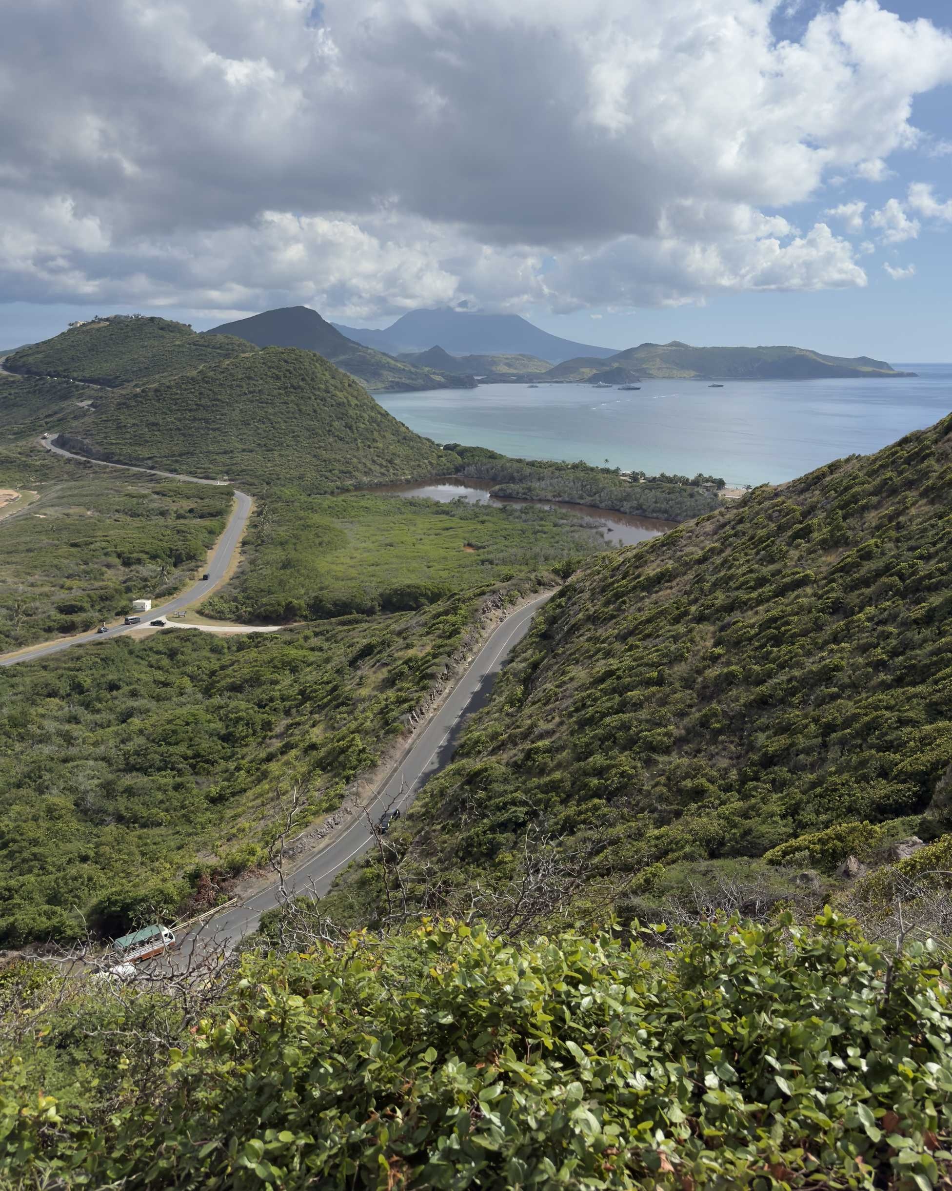 St Kitts Cruise Port - St. Kitts the View from the Top of a Mountain Looking Down at the Ocean and Mountains St K - Vertical.jpg