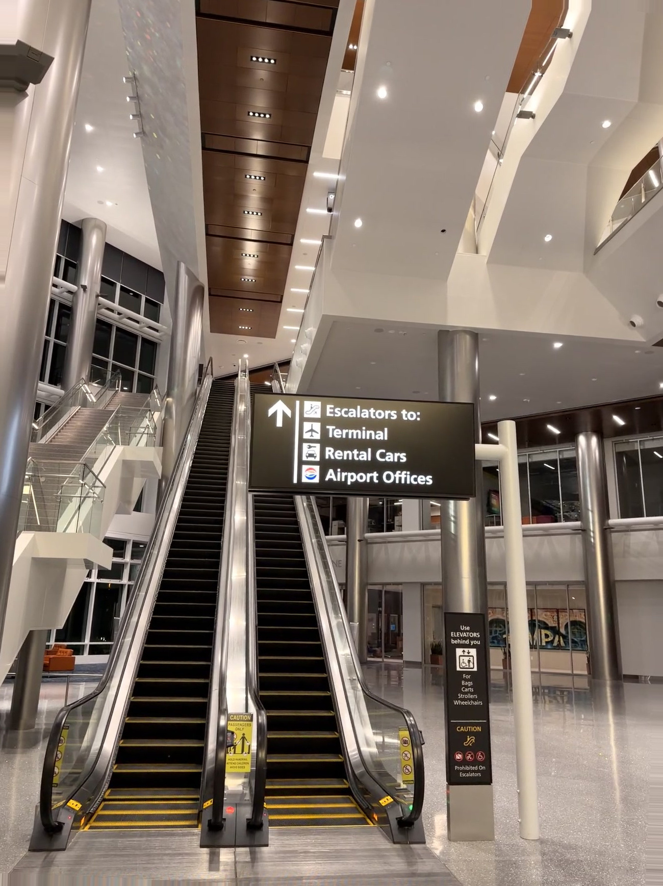 Tampa Cruise Port - Airport Terminal Escalators and Signs - 11-10-2025 - Vertical.jpg