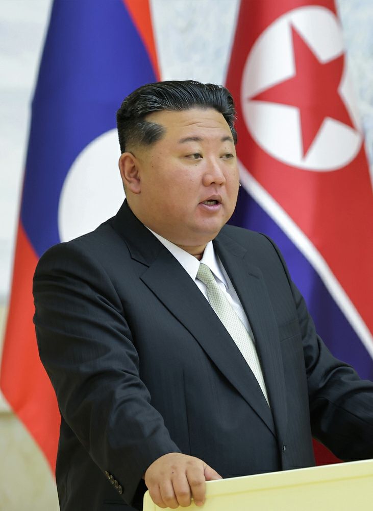 Respected Comrade Kim Jong Un Has Talks with Lao President - Image 8