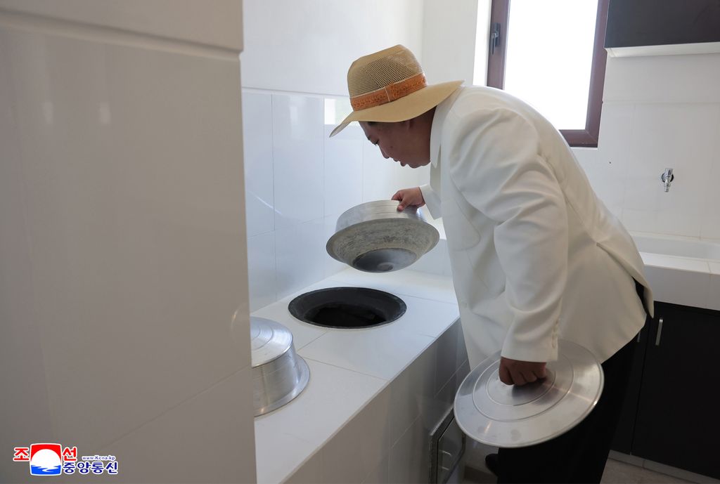 RespectedComrade Kim Jong Un visits completed Ragwon County Offshore Farm and fishermen’s residential district - Image 4