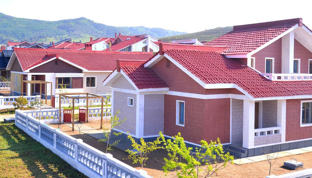 Working People in Rason Municipality Move into New Houses - Image 2