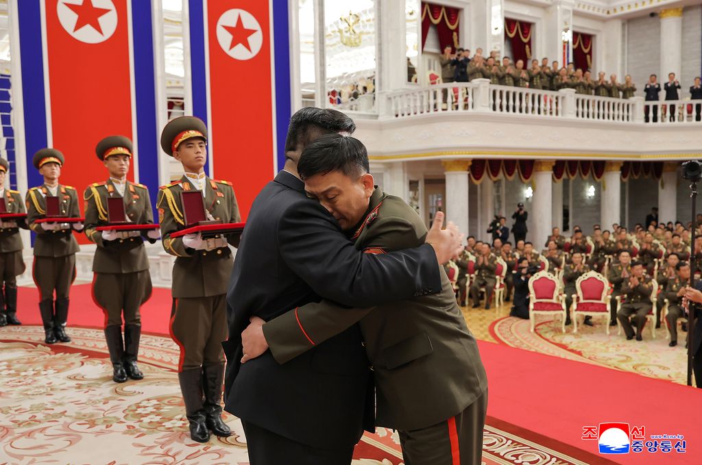 Highest glory to representatives of great honour of DPRK, admirable sonsCeremony of awarding state commendations to commanding officers and combatants of KPA overseas operation units takes place - Image 13