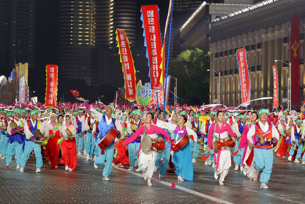 Public Procession and Torchlight Gala Take Place in DPRK - Image 23