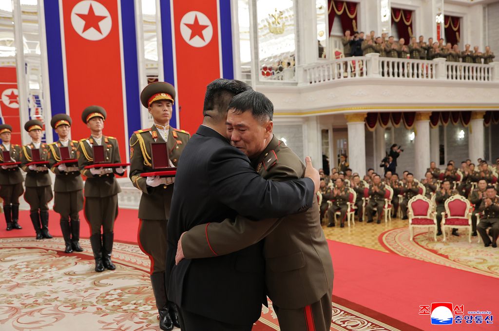 Highest glory to representatives of great honour of DPRK, admirable sonsCeremony of awarding state commendations to commanding officers and combatants of KPA overseas operation units takes place - Image 17