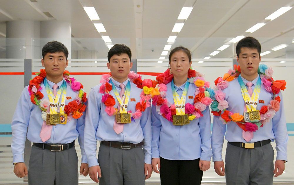 DPRK Players Return Home