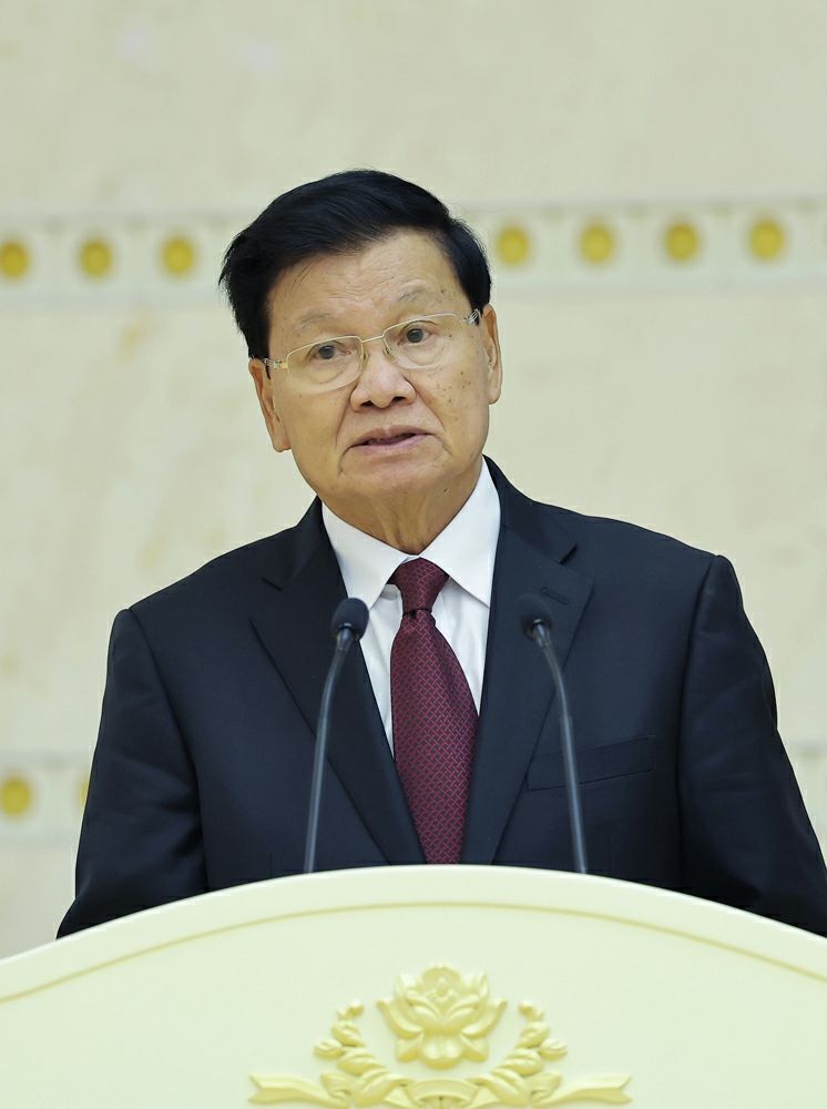 Respected Comrade Kim Jong Un Has Talks with Lao President - Image 6