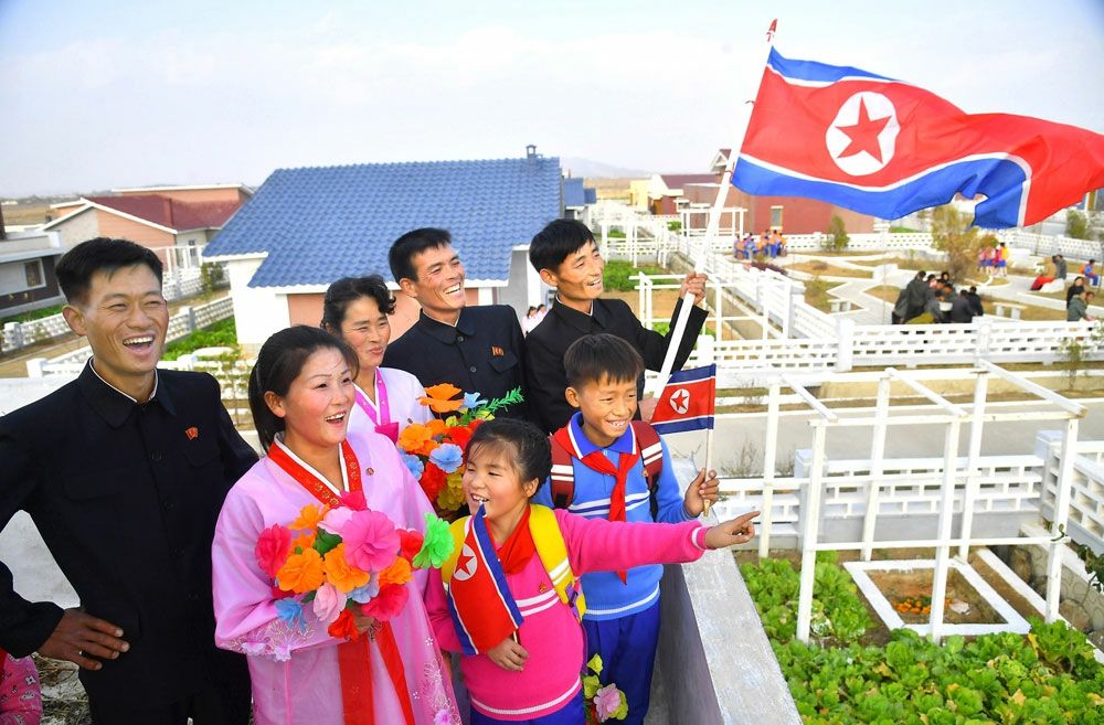 Moving into New Houses and Year-end Account Settlement and Income Distribution in Yokgudo Farm in DPRK - Image 6