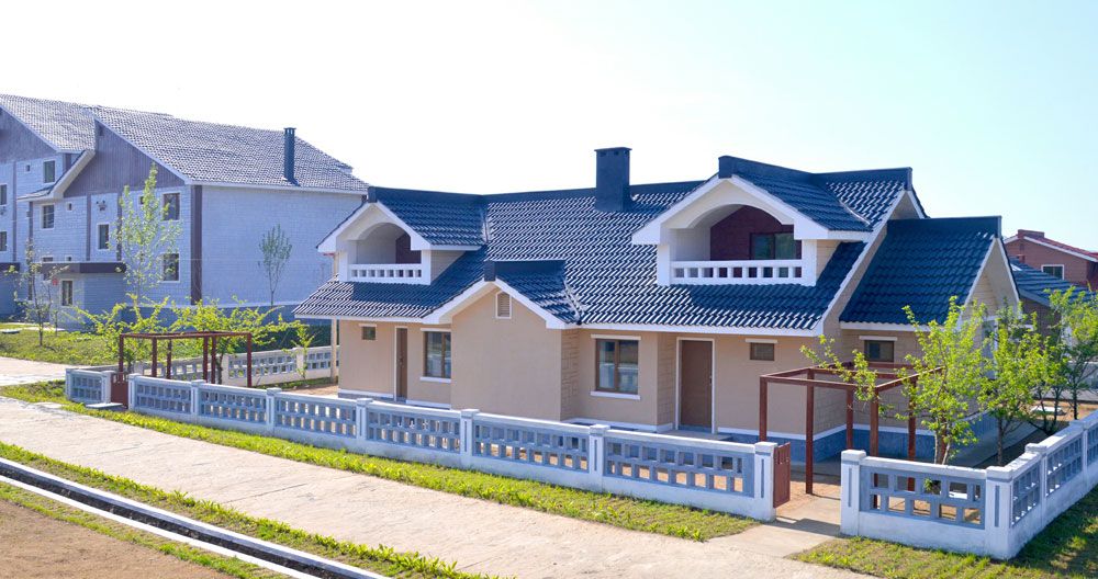 Working People in Rason Municipality Move into New Houses - Image 5