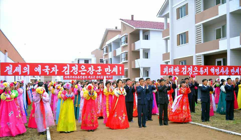 Agricultural Workers of Yombun Farm of Kyongsong County of North Hamgyong Province Move into New Houses - Image 3