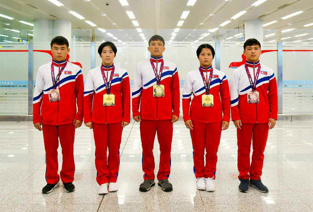 DPRK Wrestlers Return Home