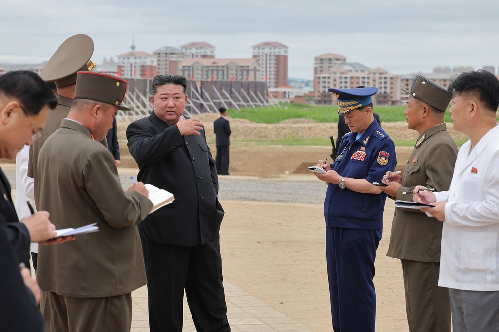 Respected Comrade Kim Jong Un Gives Field Guidance at Construction Sites of Wihwado Combined Greenhouse Farm and Permanent Embankments in Island Area
