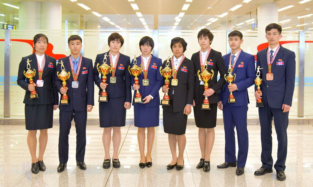 DPRK Players Return Home