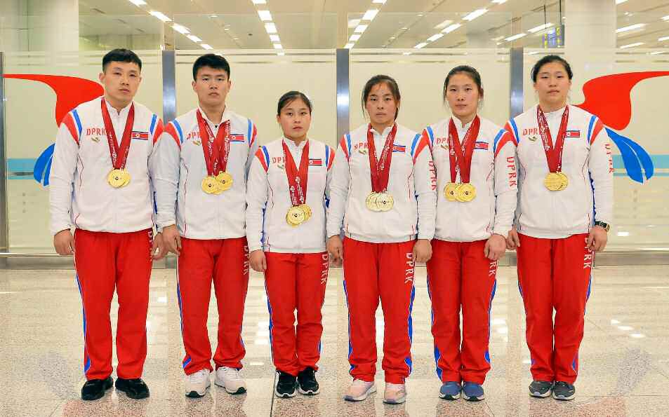 DPRK Weightlifters Return Home