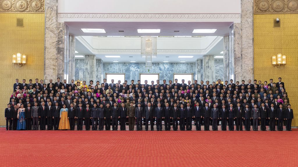 Respected Comrade Kim Jong Un Meets with Labor Innovators and Meritorious Persons - Image 4